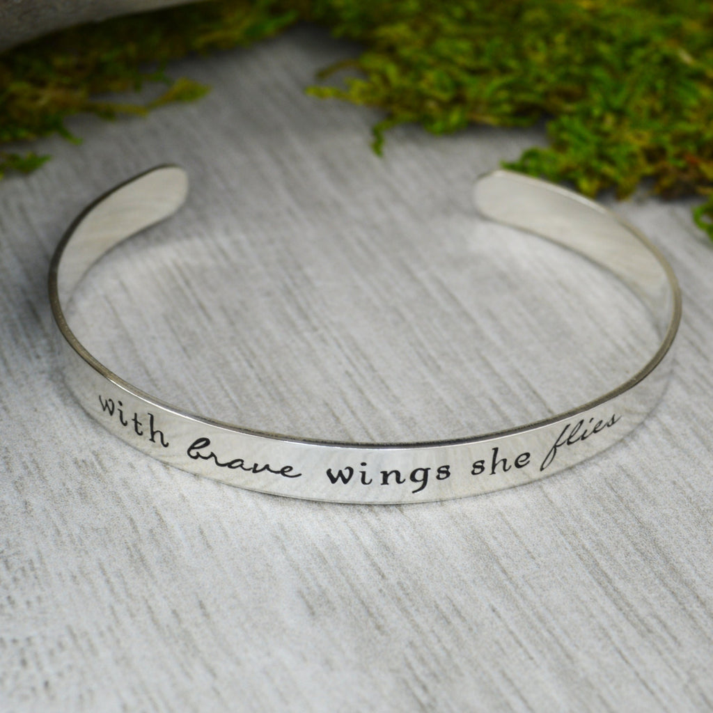 With Brave Wings She Flies Hand Stamped Aluminum Brass or Copper Bracelet