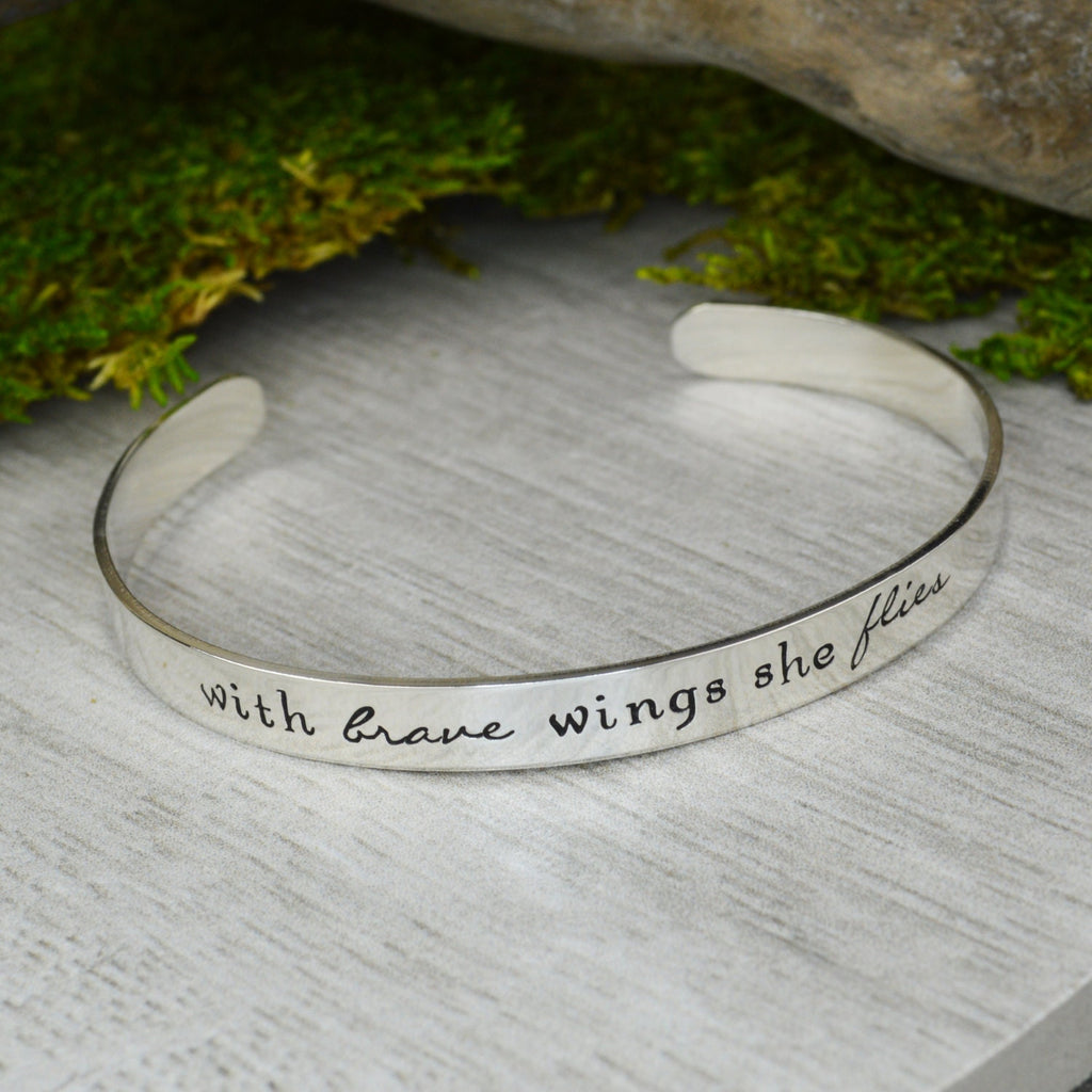With Brave Wings She Flies Hand Stamped Aluminum Brass or Copper Bracelet